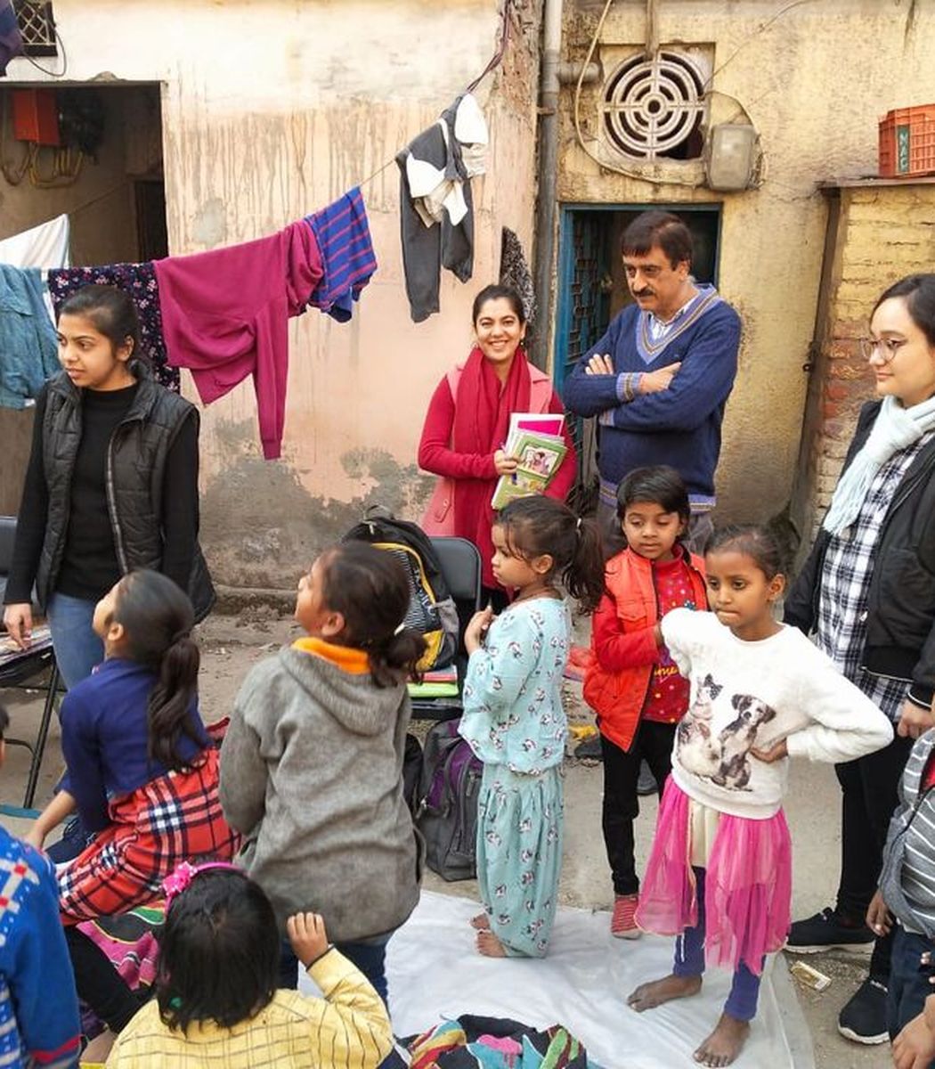 Boddhi Tree Foundation volunteers and directors with children at a learning session